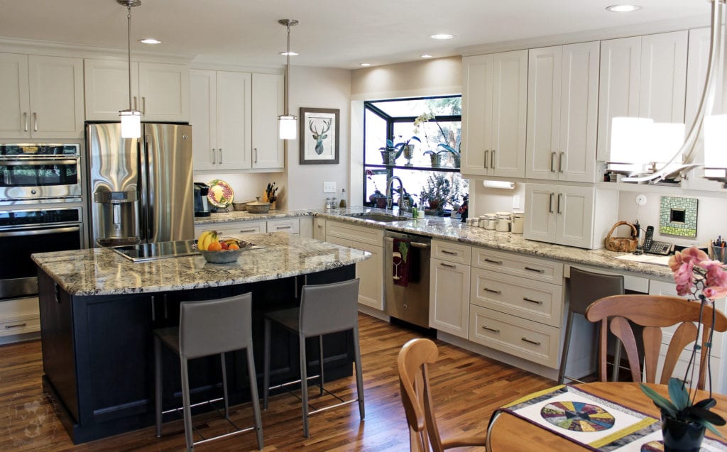 white kitchen cabinets and granite countertop