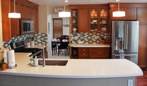 cherry cabinets white quartz kitchen countertop